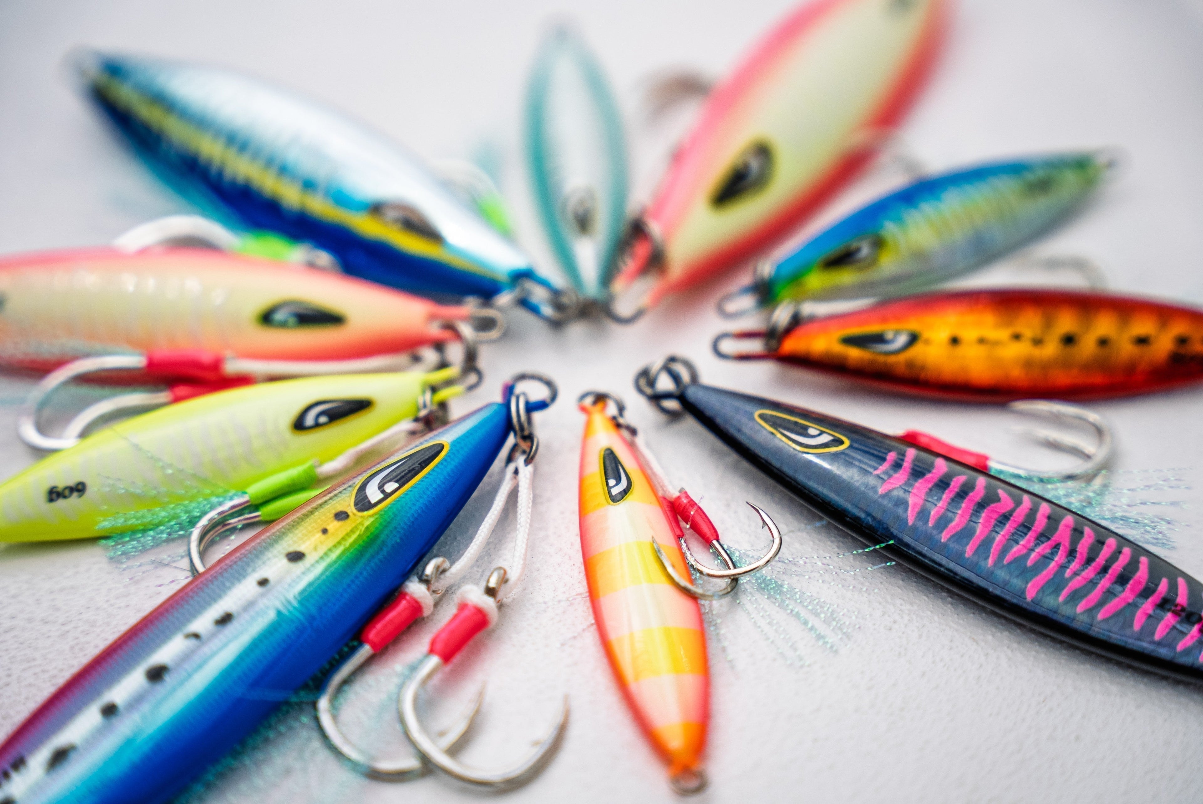 fish chasing jig lure Johnny Jigs Long Casting - Gold/Red trolling open water Deep Dive on Nomad Design